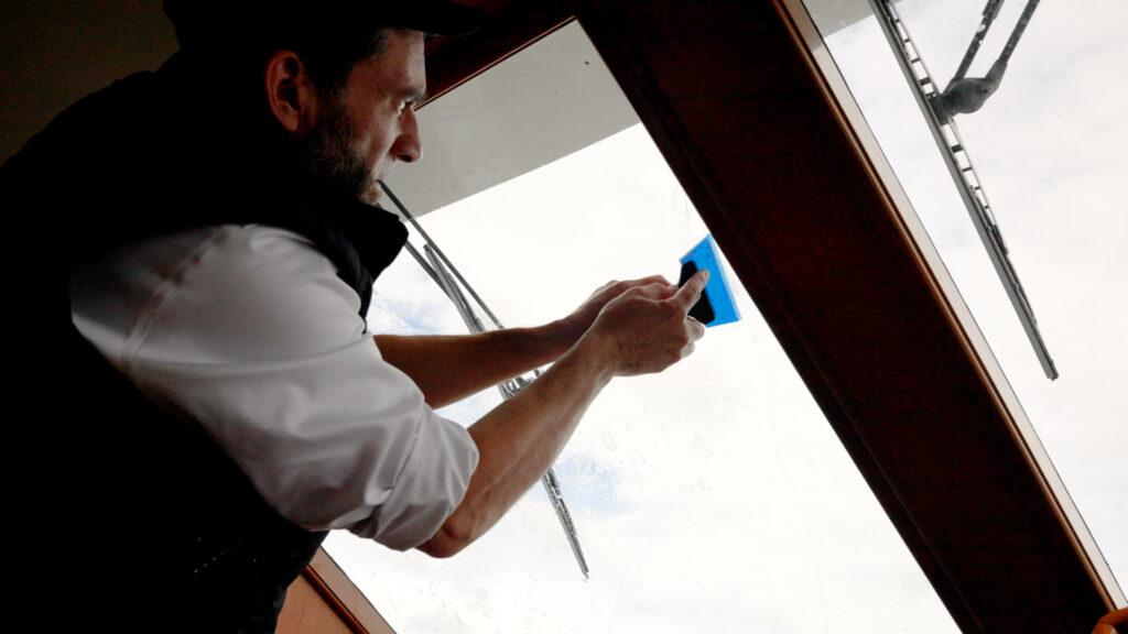 STEK Aqua Shade marine window tint getting installed